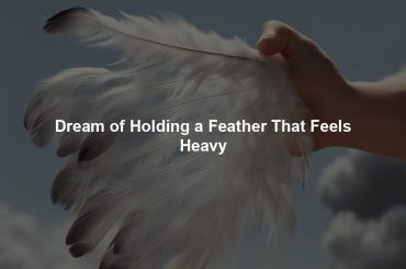 Dream of Holding a Feather That Feels Heavy